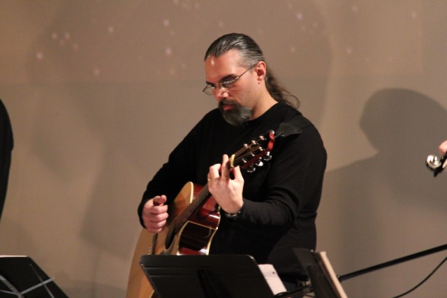 Matthew with guitar